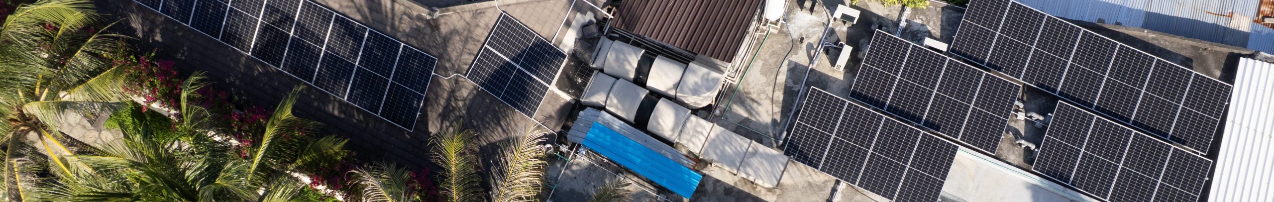 Chris standing up holding his daughter Elva