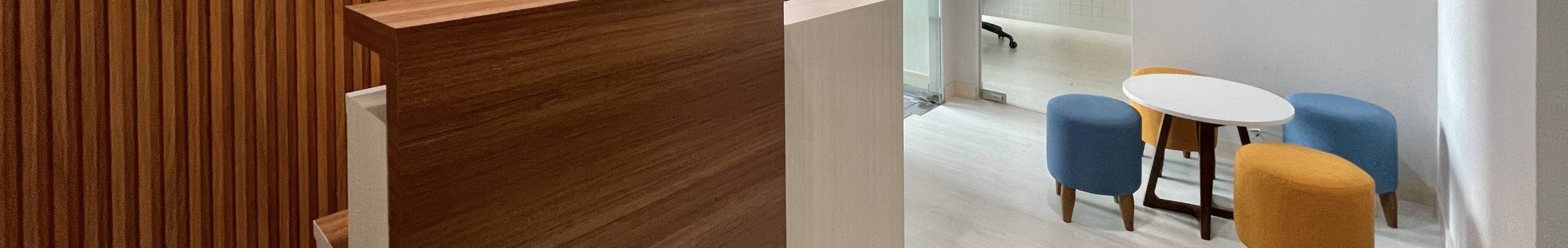 Chris standing up holding his daughter Elva